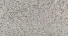 a close up view of a granite countertop with white and gray speckles