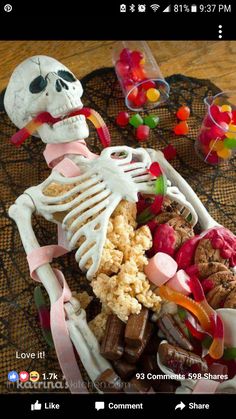 a skeleton with candy and candies in it