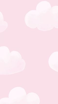 a pink background with white clouds in the sky