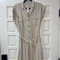 Make Me An Offer!!!! Nwt Old Navy Tan Shirt Dress With Tie. Happy Shopping! Casual Beige Shirt Dress For The Beach, Casual Neutral Shirt Dress For Spring, Neutral Shirt Dress Casual Style For Spring, Beige Relaxed Fit Casual Shirt Dress, Casual Beige Relaxed Fit Shirt Dress, Casual Beige Shirt Dress With Relaxed Fit, Casual Neutral Cotton Midi Dress, Casual Neutral Shirt Dress For Day Out, Casual Neutral Midi Dress For Vacation