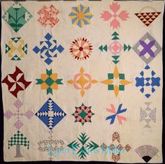 an old quilt with many different designs on it