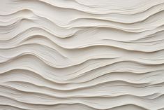 an abstract white wall with wavy lines in the form of waves on it's surface