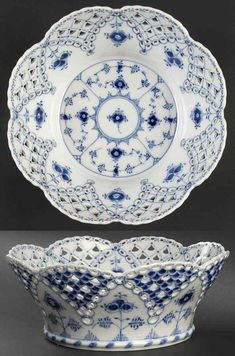 a blue and white bowl with an intricate design on the bottom, hanging from a hook