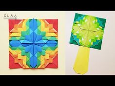 an origami piece and a tie made out of colored paper on a white background