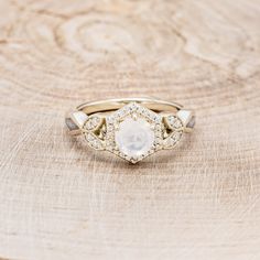 Celestial White Moonstone Ring With Halo, Celestial Style White Moonstone Ring With Halo, White Moon Phase Wedding Rings, White Moonstone Ring With Moon Phase For Weddings, Moon Shaped Moonstone Wedding Ring, Staghead Designs, Diamond Dust, Lucy In The Sky, Moonstone Engagement