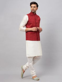 Vastramay Men's Maroon Matka Silk Nehru Jacket With Cream Silk Blend Kurta Pyjama Set A classic ensemble, this maroon matka silk Nehru jacket paired with a cream silk blend kurta pyjama set is perfect for special occasions. The jacket features a mandarin collar and full sleeves, while the kurta comes with a round neck and full sleeves. The pyjama is designed with an elasticated waistband for a comfortable fit. Features: Maroon Matka Silk Nehru Jacket Cream Silk Blend Kurta Pyjama Set Mandarin Co Maroon Jacket, Kurta Cotton, Kurta Pyjama, Nehru Jacket, Nehru Jackets, Cream Silk, Silk Jacket, Full Sleeves, Pyjama Set