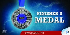 the finisher's medal is displayed on a blue ribbon with lightning in the background