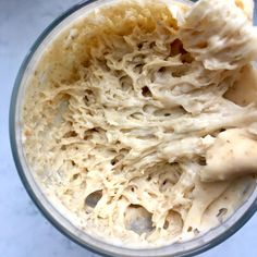 a blender filled with food on top of a counter