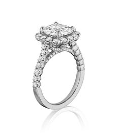 French pavé diamonds give this graceful cushion cut center stone lustrous radiance. A strand of pavé diamonds along the band adds a touch of glam. * Setting only - center diamond sold separately Diamond Halo Ring With Radiant Cut Center Stone, Radiant Cut Diamond Halo Ring With Center Stone, Cushion Cut Lab Grown Diamond Ring In Diamond White, Radiant Cut Diamond Ring With Single Cut Diamonds, White Radiant Cut Diamond Ring With Halo Setting, Dazzling Radiant Cut Diamond Halo Ring, Radiant Cut Cubic Zirconia Halo Ring, Classic Asscher Cut Halo Diamond Ring, Lab Grown White Diamond Ring, Cushion Cut