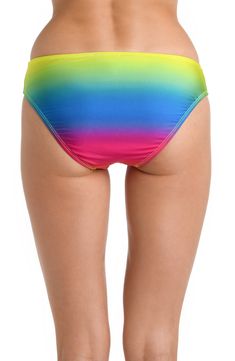 The gradient hues seamlessly blend from one shade to another, creating a vibrant and eye-catching look that embodies the spirit of celebration by the water's edge. Bursting with color, these vibrant tropical print swim bottoms with moderate coverage in back, gives you all the confidence you need to take on the day, whether swimming, snorkeling or paddle boarding. [split] Details Hipster Bottom Moderate rear coverage Fabric 87% Nylon, 13% Elastane Vibrant Summer Swim Bottoms, Multicolor Stretch Tankini For Pool, Vibrant Summer Swimming Bottoms, Rainbow Beachwear For Sunbathing, Multicolor Bottoms For Pool And Beach Season, Multicolor Beachwear Bottoms For Pool, Multicolor Tie-side Swimming Bottoms, Multicolor Tie-side Bottoms For Beach Party, Multicolor Tie-side Bottoms For Beach Season