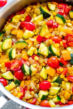 a large pot filled with lots of vegetables