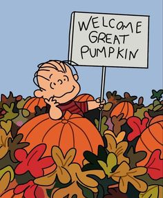 a cartoon character holding a sign that says, welcome great pumpkin in front of a bunch of pumpkins