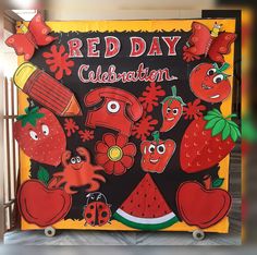 a red day celebration sign is shown in front of a gate with cartoon characters on it