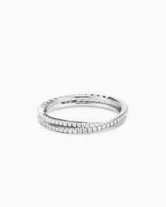 a white gold ring with diamonds on the sides and an open band in the middle