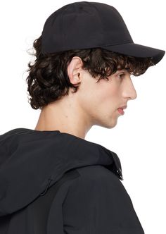 Nylon ripstop cap in black. · Embroidered eyelets at crown · Detachable logo hardware at curved brim · Bungee-style drawstring fastening at back face Supplier color: Black Nylon Cap For Streetwear, Adjustable Black Nylon Baseball Cap, Waterproof Black Nylon Hats, Nylon Streetwear Cap, Streetwear Nylon Baseball Cap, Casual Nylon Baseball Cap With Visor, Casual Nylon Visor Baseball Cap, Casual Nylon Baseball Cap With Curved Brim, Black Dad Hat For Outdoor Activities