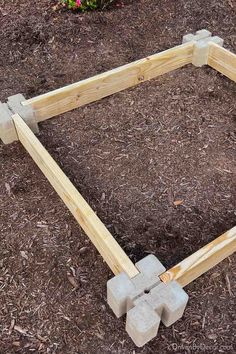 the frame is made out of concrete blocks and ready to be placed in the ground