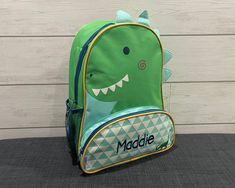 Ensure your child makes a great first impression at school and give them loads of confidence with a Stephen Joseph Sidekick Backpack. They'll love having this fun and colorful buddy that all their friends will enjoy talking about and playing with. There's plenty of room for all their books and lunch box, and even a front pocket that is the perfect size for pens and pencils. Plus, you'll know their little shoulders are comfortable with the cushioned and adjustable straps. Be sure to gear up with Nap Mat, Childrens Backpacks, Pens And Pencils, Coordinating Colors, First Impression, Kids Backpacks, Backpack Purse, Front Pocket, Lunch Box