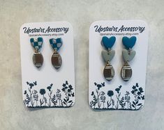 These polymer clay earrings are super lightweight and perfect for game day. Show your Detroit pride in style. Detroit Lions Clay Bead Bracelet, Detroit Lions Crochet Patterns, Detroit Lions Earrings, Detroit Lions Cricut, Detroit Lions Sweatshirt, Lion Earrings, Detroit Lions, Polymer Clay Earrings, Game Day