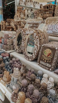 there are many decorative items for sale at the market