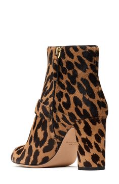 Complete your look with the lively, energetic style of an animal-spotted calf-hair boot lifted by a block heel. 3 1/4" heel; 4 1/4" shaft Side zip closure Genuine calf-hair (Vietnam) upper/textile and leather lining/leather sole Imported Calf Hair Ankle Boots For Fall, Chic Leopard Print Leather Boots, Chic High Heel Leopard Print Boots, Chic Leopard Print High Heel Boots, Chic Calf Hair Boots With Round Toe, Calf Hair, Kate Spade New York, Bootie, Side Zip