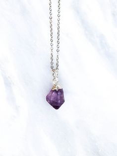 Welcome to JewelsbyGaia! ♡ Every day Raw Amethyst Crystal Necklace. ♡ The Amethyst pendants approximately measure to 2 - 2,5 cm by 1 - 1,5 cm. (Each crystal is slightly different in size). ♡ The necklace is made of stainless steel and is available in 5 different lengths. Please choose the right length of the necklace upon checkout. ♡ Lobster clasp closure. ♡ Also Available in Long-lasting real goldplating. ♡ Materials that are used for this necklace are 100% BRAND NEW. ♡ Each Crystal is natural, Amethyst Birthstone Pendant Crystal Necklace, Purple Necklace With Large Stone For Gift, Purple Amethyst Pendant Crystal Necklace, Purple Raw Stone Necklace For Gift, Spiritual Purple Necklace With Large Stone, Purple Amethyst Necklace With Raw Stone, Purple Raw Stone Crystal Pendant Necklace, Purple Crystal Necklace With Stones As A Gift, Purple Crystal Necklaces With Stones For Gift