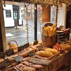 breads and pastries are on display at the market