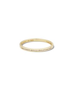 a yellow gold ring with small diamonds on the side and a thin band around it