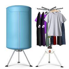 an image of clothes drying on a rack next to a large blue tank and tripod