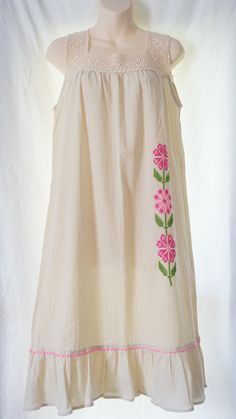 This is an Authentic Turkish hand sewed loose flowy women summer dress made with 100% cotton. Made from a special handmade garment in Turkey for over 150 years called "Sile Bezi".  + It's a short shoulder strap beige dress with big pink Turkish flower motifs.  + For best fit please see below for fit measurements + Please note that the dress comes with special washing instructions. It's perfect for hot summer days. It's very light and airy. Can be dressed at the beach or casually during days or at nights.  One of a kind design makes this dress unique. Each size may have different colors and motifs. Therefore each dress is completely uniquely made almost once.  Measurements: ------------------------------------------- Dress Length: 39" (from shoulder to bottom) Neck Gap: 7" Arm Gap (Diagonal Summer Cotton Sundress With Floral Embroidery, Cotton Beach Dress With Floral Embroidery, Beach Cotton Dress With Floral Embroidery, Beach Dress With Floral Embroidery In Cotton, Beige Cotton Summer Sundress, Summer Beige Cotton Sundress, Beige Cotton Sundress For Summer, Beige Cotton Sundress, Natural Cotton Bohemian Dress