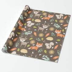 a wrapping paper with woodland animals on it