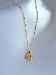 A beautiful and unique necklace symbolising eternity and interconnectedness. Gold Celtic charm necklace, Irish charm necklace This listing is for an elegant gold Celtic charm pendant necklace. It comprises a small gold vermeil Celtic charm on gold fill chain. The necklace closes with a gold fill clasp and has a small extender chain attached. Measurements - in image listing at 17 inches. Please make your size selection from the drop down box.  Celtic charm - 14 mm The necklace comes boxed ready f Luck Necklace, Celtic Necklace, Pendant Necklace Gold, Irish Celtic, Charm Pendant Necklace, Unique Necklace, Gold Filled Chain, Unique Necklaces, Necklace Gold