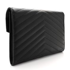 a black leather wallet is shown on a white background and it has an arrow pattern