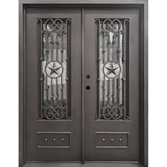 an iron door with two sidelights and glass panels