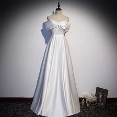 White Pearl Prom Dress, White Evening Dress For Prom Season, White Satin Ball Gown For Formal Occasions, White Ball Gown For Prom And Evening Events, White Ball Gown For Prom Evening, White Evening Dress For Prom Season Banquet, White Satin Ball Gown Evening Dress, White Evening Dress With Sweep Train For Prom, Satin Wedding Dress For Banquet During Prom Season