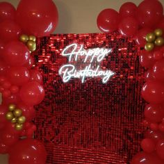 a happy birthday card with red balloons and streamers