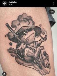 a frog with a hat holding a baseball bat