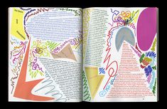 an open book with colorful drawings on it