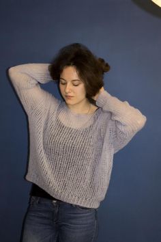 Loose knit soft alpaca sweater perfect for sensitive skin. Hand knit airy sweater jumper is very light, still warm and cozy.Pale blue alpaca fuzzy pullover is perfect for casual and everyday usage, made loose fit, will go perfect with jeans, shorts, summer dresses and may combine easily with many colors.    Oversized airy-but-warm compact sweater jumper. Bohemian clothing. Width: 24" (60 cm)Length: 21" (53 cm)Sleeves: 20" (51 cm)Neck opening: 13" (33 cm)It fit size M-XLREADY TO SHIPMaterial luxu Mohair Knitted Sweater For Layering, Mohair Layering Sweater With Open Knit, Casual Mohair Fine Knit Sweater, Mohair Open Knit Sweater For Layering, Cozy Mohair Fine Knit Sweater, Bohemian Crew Neck Sweater For Layering, Casual Long Sleeve Mohair Tops, Alpaca Long Sleeve Sweater For Layering, Casual Mohair Knit Sweater