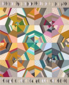 an abstract painting with many different colors and shapes, including geometric shapes in the center