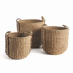 three woven baskets with handles on each side