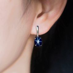 This Earrings Features a 6X8 MM Oval Cabochon Natural Lindy Star and Sterling Silver Finished with rhodium. Customization is available. It is made by hand, and it will take about 3 to 5 business days to finish the ring after your payment is completed. Product Description Main stone: Natural Blue Lindy Star Metal type: 92.5 Sterling Silver finished with rhodium How To take care of This Earrings - Keep the jewelry away from direct heat, water, perfumes, deodorants, and other strong chemicals. Wipe Elegant Blue Star-shaped Jewelry, Sterling Silver Sapphire Star Jewelry, Blue Star-shaped Sterling Silver Earrings, Blue Sterling Silver Star Earrings, Blue Star-shaped Jewelry For Formal Occasions, Formal Blue Star-shaped Jewelry, Blue Star Earrings, Earrings For Bride, Silver Prices