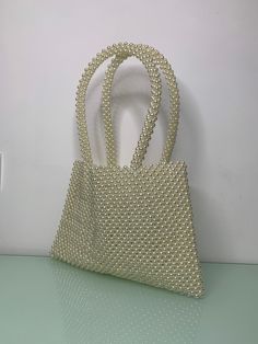 Knitkos beaded Pearl bag This model can FITS :  - Any Phone - flat  - car keys ID  - driver's license  - headphones / AirPods  - cardholder  - cash lipstick  - antiseptic Dimensions - Width:  (20 cm.) - Height:  (30 cm.) - length of handle (51cm) Bags are 100% handmade.This size making it perfect to hold your keys, cards, money and smartphones. I hope you collect great memories with this bag. SHIPPING  TIME (time 14-20 days) also you can choose EXPRESS shipping (7-14 days) SHIPPING - This clutch is made and ready to ship - Ships worldwide from Kiev,Ukraine - Processing time prior to shipping is the same days - Free shipping Feel free to contact me for any question, by hitting the «Message the seller» button at the end of this page Cream Beaded Rectangular Shoulder Bag, Cream Beaded Pearl Shoulder Bag, Pearl Beaded Shoulder Bag For Daily Use, Everyday Pearl Beaded Shoulder Bag, Crystal Bead Bag, Bead Bag, Time Time, Kiev Ukraine, Pearl Bag