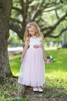 Give her the perfect dress with this Adorable Blush Pink Flower Girl Dress. This dress comes with charming lace bodice and an elegant long flowing tulle skirt. Whether you're choosing your flower girl or just adding to your collection, this unique dress will definitely make a bold statement. Order Swatches Here if desired Please include sash color in cart notes. Please use our "chat bubble" if you need assistance. Care: Hand wash, line or dry flat. Clothes steamer to remove wrinkles. Full Length Tulle Skirt, Dance Portraits, Pink Flower Girl Dress, Vintage Flower Girls, Flower Girl Dresses Vintage, Chat Bubble, Dress For Weddings, Pink Flower Girl, Pink Roses Wedding