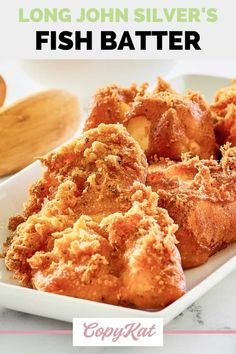 fried fish on a white plate with text that reads long john silver's batter fried fish