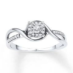 a white gold ring with diamonds on it