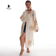 Introducing our Boho Cotton Kimono Robe, a must-have Morning Robe made of sustainable fabric for the eco-conscious and style-savvy individual. This luxurious robe is perfect for lounging in style or adding a bohemian touch to your everyday outfit. Handcrafted with care and attention to detail, this kimono robe is fashionable and eco-friendly. Embrace comfort and sustainability with our exquisite Boho Cotton Kimono Robe. ⭐ CODE: 400504016 ⭐ Fabric: 100% Cotton ⭐ Size: One Size ⭐ Category: Kimono, Cream Long Sleeve Kimono For Summer, Cream Long Sleeve Summer Kimono, Summer Cream Long Sleeve Kimono, Long-sleeved Cream Summer Robe, Long Sleeve Cream Robe For Summer, Cream Long Sleeve Summer Robe, Beach Long Sleeve Cream Kimono, Cream Long Sleeve Beach Kimono, Bohemian Beige Summer Robe