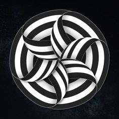 an abstract black and white circular design on a dark background with space in the middle