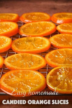 orange slices on a cooling rack with the words easy homemade candied orange slices