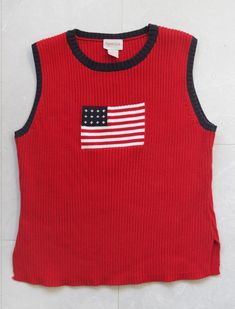 Vintage bright red US flag pattern cotton rib knit sleeveless sweater unisex vest top. Round neck, no lining. Made of 100% cotton. Tag: CRYSTAL KOLE Size XL Made in Mexico. Measured laying flat (please note, that as knitted item, it stretches): 22'' / 56 cm long 20'' / 51 cm armpit to armpit Great vintage condition. Flag Pattern, Crochet Triangle, Top Round, Us Flag, Vintage Adidas, Sleeveless Sweater, Knit Vest, Vest Top, Black Print