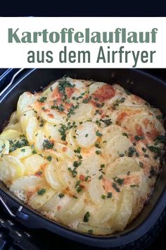 a casserole dish with potatoes and herbs in it